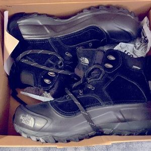 Brand new in box the north face winter waterproof boots. Never worn new in box.